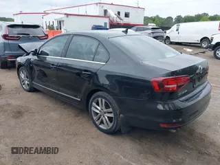 2017 Volkswagen Jetta SEL z VIN 3VWL17AJ1HM406515, wystawiony jako IAAI lot #42660560 z przebiegiem 88 253 mil mil oraz . Historia ofert i sprzedaży dostępna na DreamBid. Obrazek 3.