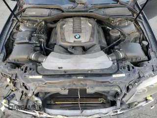 2006 BMW 7 Series 750i with VIN WBAHL83506DT05674, listed as a Copart auction lot 77176834 with 263,495 mi miles and Salvage title. Bid and sale history available at DreamBid. Image 11.