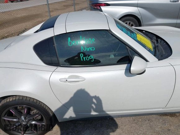 2020 Mazda MX-5 Miata Grand Touring с VIN JM1NDAM73L0414658, выставлен на аукционе IAAI как лот 42451595 с пробегом 73 339 миль миль и . История ставок и продаж доступна на DreamBid. Изображение 13.