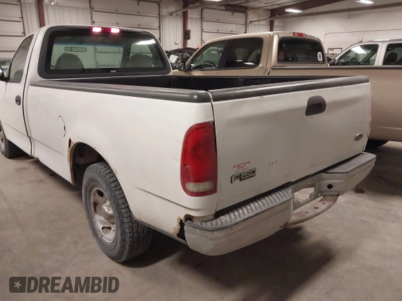 2000 Ford F-150 XL with VIN 1FTRF17W8YKB33949, listed as a IAAI auction lot 41519978 with 228,931 mi miles. Bid and sale history available at carsss.com. Image 12.