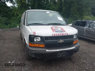 2013 Chevrolet Express Cargo with VIN 1GCSGAFX2D1102477, listed as a IAAI auction lot 42650482 with 77,551 mi miles and . Bid and sale history available at DreamBid. Image 12.