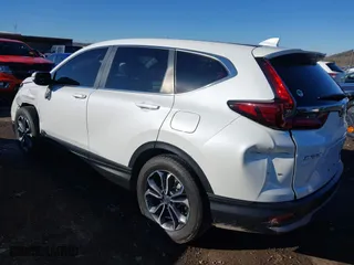2021 Honda CR-V EX-L with VIN 2HKRW1H89MH409581, listed as a IAAI auction lot 41353401 with 99,968 mi miles. Bid and sale history available at carsss.com. Image 3.