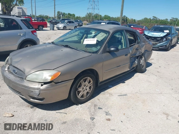 2006 Ford Taurus SE with VIN 1FAFP53U96A223924, listed as a IAAI auction lot 41828443 with 114,653 mi miles. Bid and sale history available at carsss.com. Image 2.