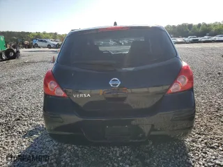2009 Nissan Versa 1.8 SL with VIN 3N1BC13E59L500137, listed as a Copart auction lot 52339125 with 121,643 mi miles and Salvage Title. Bid and sale history available at carsss.com. Image 6.