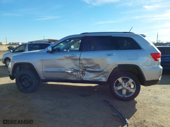 2012 Jeep Grand Cherokee Overland with VIN 1C4RJFCTXCC201422, listed as a IAAI auction lot 41283376 with 93,736 mi miles. Bid and sale history available at carsss.com. Image 14.