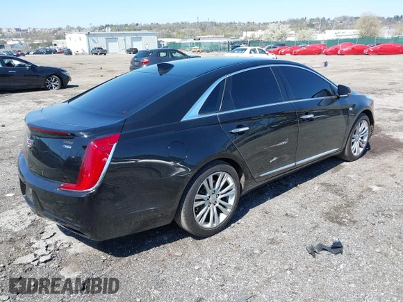 2018 Cadillac XTS Luxury with VIN 2G61M5S39J9161938, listed as a IAAI auction lot 42005882 with 102,335 mi miles. Bid and sale history available at carsss.com. Image 4.