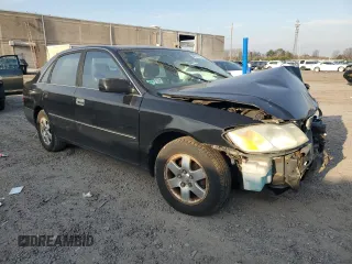 2001 Toyota Avalon XL z VIN 4T1BF28B61U175674, wystawiony jako Copart lot #49913765 z przebiegiem 170 245 mil mil oraz Tytuł czysty. Historia ofert i sprzedaży dostępna na DreamBid. Obrazek 4.