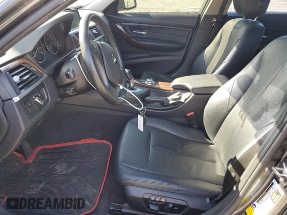 2013 BMW 3 Series 328i xDrive with VIN WBA3B3C56DF530814, listed as a Copart auction lot 52820915 with 144,164 mi miles and Salvage Title. Bid and sale history available at carsss.com. Image 7.