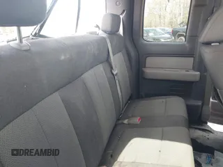 2009 Ford F-150 STX with VIN 1FTRX14809KC94736, listed as a IAAI auction lot 41721775 with 141,875 mi miles. Bid and sale history available at carsss.com. Image 8.