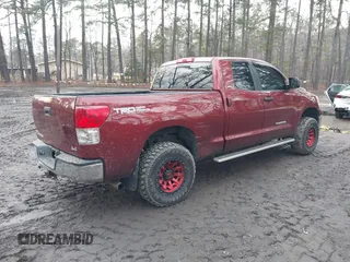 2010 Toyota Tundra 4WD Truck with VIN 5TFUM5F13AX008637, listed as a IAAI auction lot 41458700 with 212,845 mi miles. Bid and sale history available at carsss.com. Image 4.