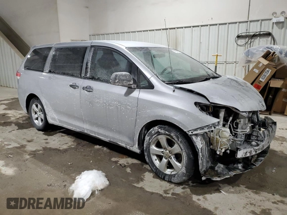 2012 Toyota Sienna with VIN 5TDZK3DC7CS231079, listed as a Copart auction lot 41809535 with 157,154 mi miles and Salvage Title. Bid and sale history available at carsss.com. Image 4.