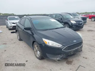 2018 Ford Focus SE z VIN 1FADP3F24JL212901, wystawiony jako IAAI lot #41947880 z przebiegiem 199 123 mil mil oraz . Historia ofert i sprzedaży dostępna na DreamBid. Obrazek 1.