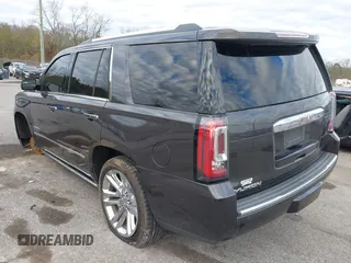 2017 GMC Yukon Denali with VIN 1GKS1CKJ0HR153941, listed as a IAAI auction lot 41300648 with 128,193 mi miles. Bid and sale history available at carsss.com. Image 3.