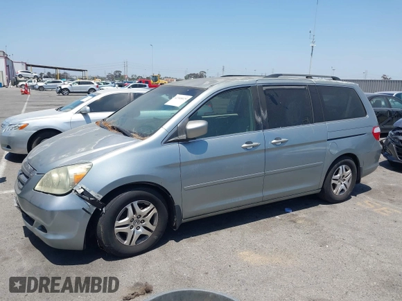 2005 Honda Odyssey EX with VIN 5FNRL38415B086709, listed as a IAAI auction lot 42308829 with 187,351 mi miles and . Bid and sale history available at DreamBid. Image 2.