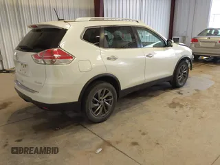 2016 Nissan Rogue SV with VIN KNMAT2MV7GP703027, listed as a IAAI auction lot 42082235 with 101,992 mi miles and . Bid and sale history available at DreamBid. Image 4.