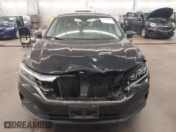 2020 Volkswagen Passat SE with VIN 1VWWA7A3XLC021477, listed as a IAAI auction lot 42473029 with 96,434 mi miles and . Bid and sale history available at DreamBid. Image 13.