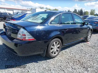 2008 Ford Taurus SEL with VIN 1FAHP24W98G140677, listed as a IAAI auction lot 42087217 with 151,693 mi miles. Bid and sale history available at carsss.com. Image 4.
