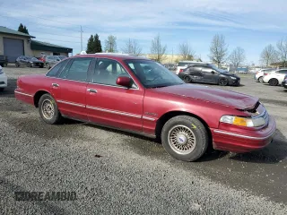 1995 Ford Crown Victoria LX с VIN 2FALP74W2SX117864, выставлен на аукционе Copart как лот 52440825 с пробегом 109 409 миль миль и Списание • Salvage title. История ставок и продаж доступна на DreamBid. Изображение 4.