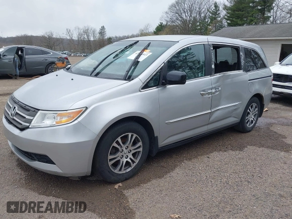 2011 Honda Odyssey EX with VIN 5FNRL5H42BB021018, listed as a IAAI auction lot 42044513 with 189,493 mi miles and . Bid and sale history available at carsss.com. Image 2.