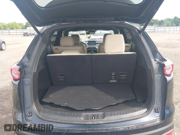 2020 Mazda CX-9 Grand Touring with VIN JM3TCBDY1L0402718, listed as a IAAI auction lot 42355511 with 87,205 mi miles and . Bid and sale history available at DreamBid. Image 17.