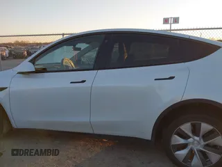 2023 Tesla Model Y Long Range z VIN 7SAYGDEE6PA061228, wystawiony jako IAAI lot #41371547 z przebiegiem 25 121 mil mil oraz . Historia ofert i sprzedaży dostępna na DreamBid. Obrazek 14.