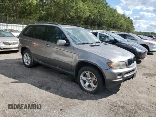 2006 BMW X5 3.0i with VIN 5UXFA13596LY39333, listed as a Copart auction lot 74065624 with 209,454 mi miles and Salvage Title. Bid and sale history available at carsss.com. Image 4.