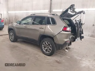 2021 Jeep Cherokee Trailhawk z VIN 1C4PJMBX5MD231018, wystawiony jako IAAI lot #42029850 z przebiegiem 66 525 mil mil oraz . Historia ofert i sprzedaży dostępna na DreamBid. Obrazek 3.