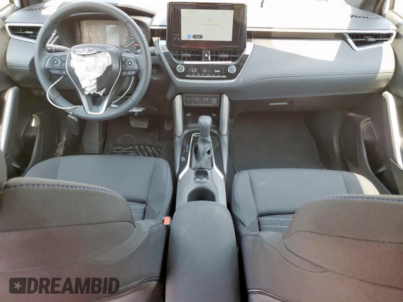 2025 Toyota Corolla Cross Hybrid S с VIN 7MUFBABG3SV077116, выставлен на аукционе Copart как лот 57056335 с пробегом 139 миль миль и Списание • Salvage title. История ставок и продаж доступна на DreamBid. Изображение 8.