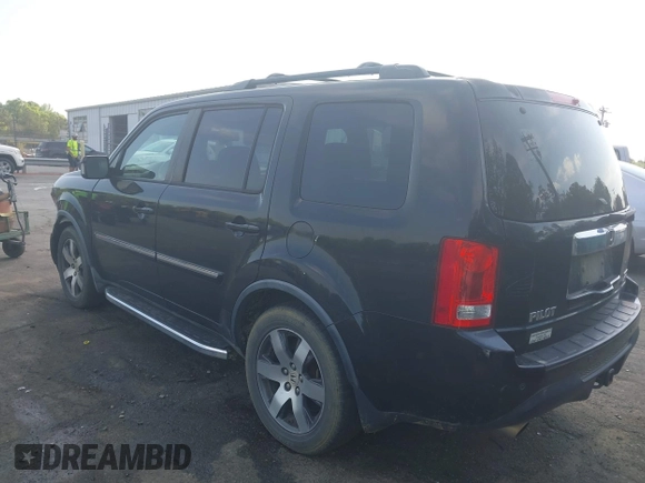 2012 Honda Pilot Touring with VIN 5FNYF4H95CB026191, listed as a IAAI auction lot 42021987 with 229,273 mi miles and . Bid and sale history available at DreamBid. Image 3.