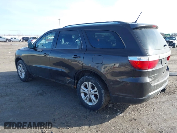 2013 Dodge Durango SXT with VIN 1C4RDJAG3DC512367, listed as a IAAI auction lot 41721437 with 176,092 mi miles. Bid and sale history available at carsss.com. Image 3.