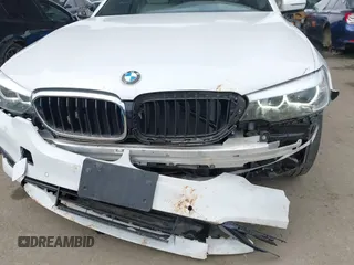 2018 BMW 5 Series 530e with VIN WBAJA9C5XJB033667, listed as a IAAI auction lot 42107936 with 55,753 mi miles and . Bid and sale history available at DreamBid. Image 6.