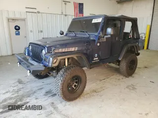 2006 Jeep Wrangler SE with VIN 1J4FA29126P705827, listed as a Copart auction lot 82226674 with 165,632 mi miles and Salvage Title. Bid and sale history available at carsss.com. Image 1.