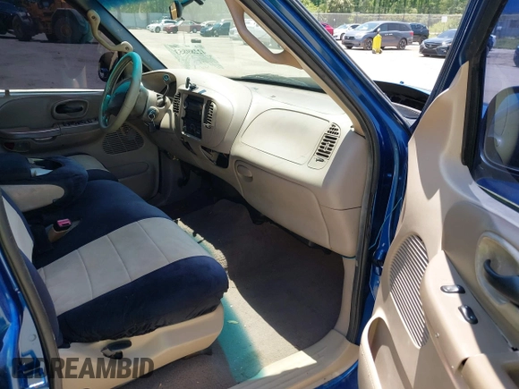 2001 Ford F-150 XLT with VIN 1FTRW07W01KE90204, listed as a IAAI auction lot 42289853 with Not provided miles and . Bid and sale history available at DreamBid. Image 5.