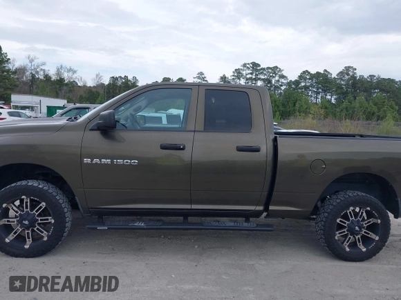 2012 Ram 1500 ST with VIN 1C6RD6FK9CS193403, listed as a IAAI auction lot 41878684 with 264,250 mi miles and . Bid and sale history available at DreamBid. Image 14.