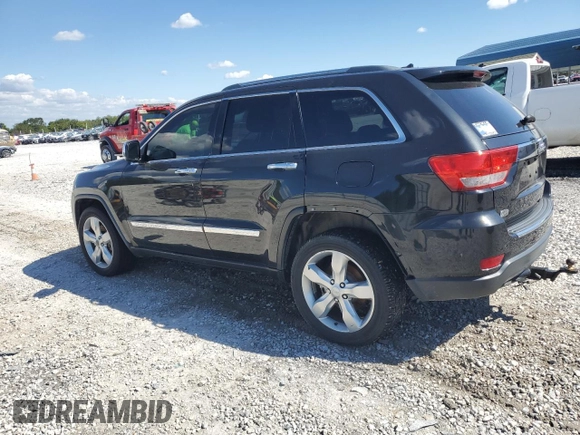 2013 Jeep Grand Cherokee Overland with VIN 1C4RJECG5DC595989, listed as a Copart auction lot 73385354 with 157,876 mi miles and Clean Title. Bid and sale history available at carsss.com. Image 2.