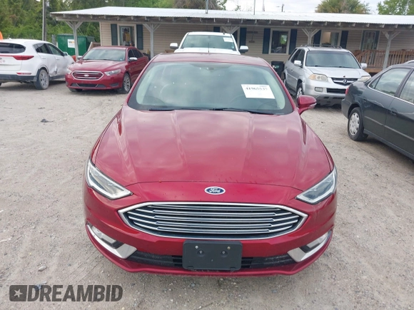 2017 Ford Fusion SE z VIN 3FA6P0HD2HR401046, wystawiony jako IAAI lot #41965539 z przebiegiem 92 664 mil mil oraz . Historia ofert i sprzedaży dostępna na DreamBid. Obrazek 12.