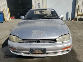 1994 Toyota Camry LE z VIN JT2GK12EXR0070117, wystawiony jako Copart lot #75997244 z przebiegiem 185 759 mil mil oraz Czysty tytuł • Clean title. Historia ofert i sprzedaży dostępna na DreamBid. Obrazek 5.