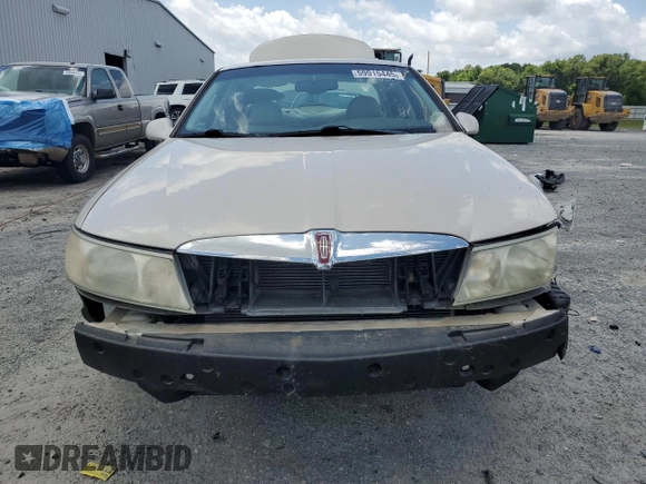 2001 Lincoln Continental z VIN 1LNHM97V91Y622267, wystawiony jako Copart lot #59915445 z przebiegiem 77 070 mil mil oraz Szkoda całkowita • Salvage title. Historia ofert i sprzedaży dostępna na DreamBid. Obrazek 5.