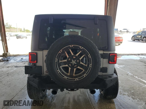 2016 Jeep Wrangler Unlimited Sport с VIN 1C4BJWDG5GL329916, выставлен на аукционе Copart как лот 55141825 с пробегом 54 074 миль миль и Списание • Salvage title. История ставок и продаж доступна на DreamBid. Изображение 6.
