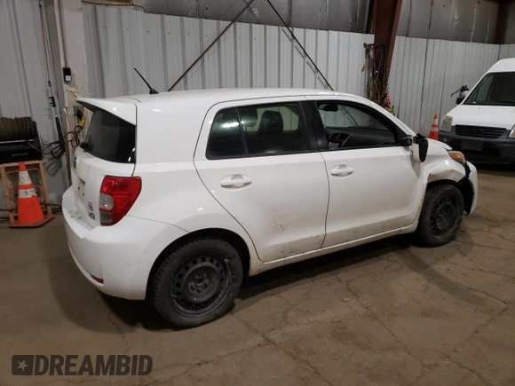 2014 Scion xD with VIN JTKKUPB48E1046627, listed as a Copart auction lot 61498995 with 63,452 mi miles and Salvage title. Bid and sale history available at DreamBid. Image 3.