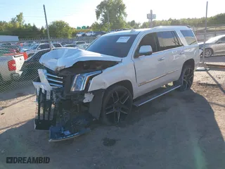 2016 Cadillac Escalade Premium Collection with VIN 1GYS4CKJ4GR387558, listed as a IAAI auction lot 40447019 with 98,517 mi miles. Bid and sale history available at carsss.com. Image 2.