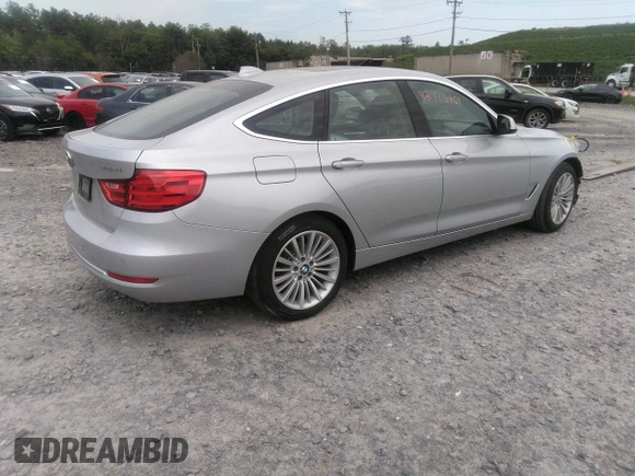 2014 BMW 3 Series 328i Gran Turismo xDrive z VIN WBA3X5C58ED558625, wystawiony jako IAAI lot #42473401 z przebiegiem 106 419 mil mil oraz . Historia ofert i sprzedaży dostępna na DreamBid. Obrazek 4.