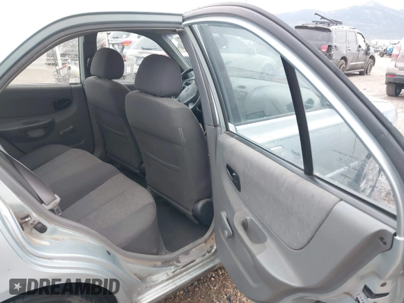 2003 Hyundai Accent GL z VIN KMHCG45C43U465523, wystawiony jako IAAI lot #40883056 z przebiegiem 95 770 mil mil oraz . Historia ofert i sprzedaży dostępna na DreamBid. Obrazek 8.