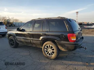 2001 Jeep Grand Cherokee Limited with VIN 1J4GX58S01C652737, listed as a Copart auction lot 81635494 with 175,498 mi miles and Salvage Title. Bid and sale history available at DreamBid. Image 2.