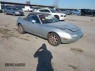 1991 Mazda MX-5 Miata Special Edition z VIN JM1NA3513M0200690, wystawiony jako IAAI lot #41788082 z przebiegiem 284 446 mil mil oraz . Historia ofert i sprzedaży dostępna na DreamBid. Obrazek 1.