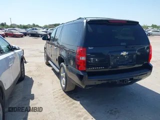 2011 Chevrolet Suburban LT with VIN 1GNSCJE09BR235355, listed as a IAAI auction lot 42030105 with 308,576 mi miles. Bid and sale history available at carsss.com. Image 3.