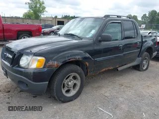 2004 Ford Explorer Sport Trac XLS with VIN 1FMZU77K64UA21537, listed as a IAAI auction lot 42697234 with 177,944 mi miles and . Bid and sale history available at DreamBid. Image 2.