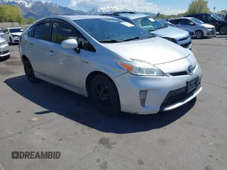 2015 Toyota Prius Four z VIN JTDKN3DU6F0477579, wystawiony jako IAAI lot #42149800 z przebiegiem 233 443 mil mil oraz . Historia ofert i sprzedaży dostępna na DreamBid. Obrazek 1.