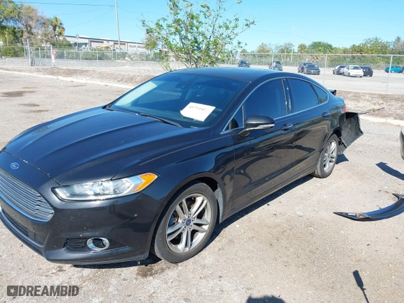 2015 Ford Fusion Titanium Hybrid with VIN 3FA6P0RUXFR119698, listed as a IAAI auction lot 41791411 with 140,646 mi miles. Bid and sale history available at carsss.com. Image 19.