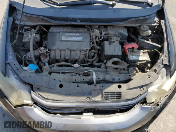 2010 Honda Insight LX with VIN JHMZE2H59AS041185, listed as a Copart auction lot 64517415 with 208,242 mi miles and Salvage title. Bid and sale history available at DreamBid. Image 11.
